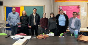 Members of the NLS in 2025 at a community event.