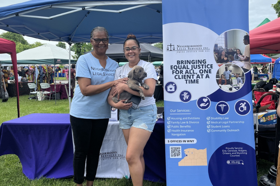 Tany and Pearl tabling outside with a dog.
