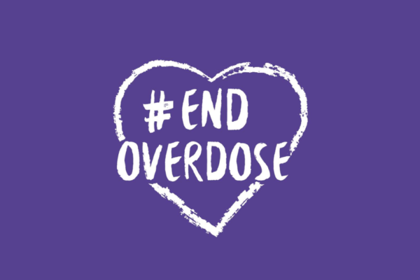 #EndOverdose in a heart shape on a purple background.
